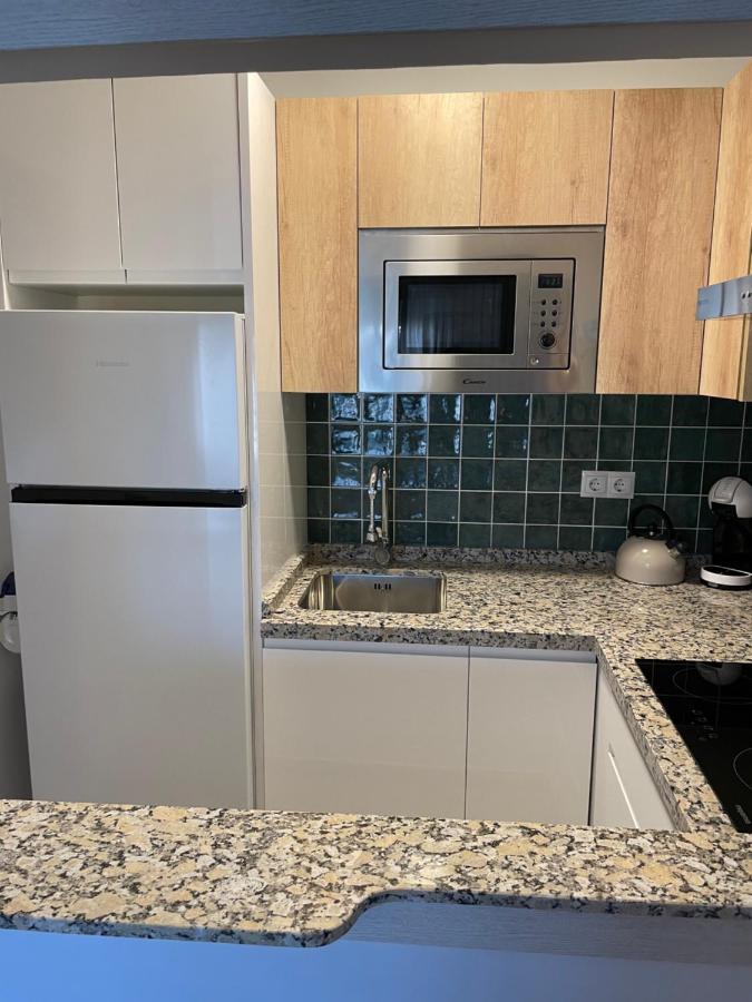 Apartamento totalmente reformado con piscina y jardines al lado de la playa de la Carihuela Torremolinos Exterior foto